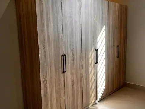 Wood-grain wardrobe after assembly