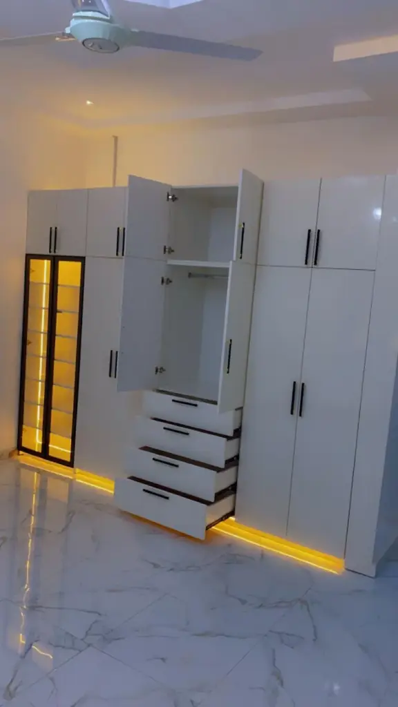 Wardrobe with LED lighting fitted by our furniture assembly experts