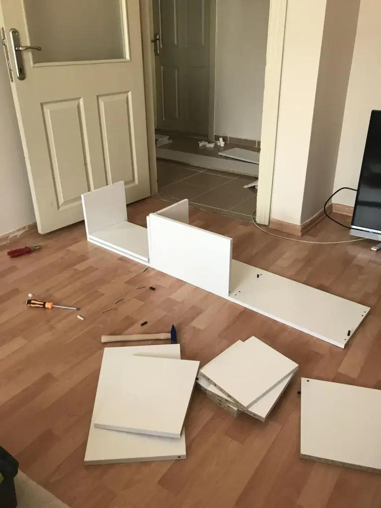 Flat-pack furniture assembly tips: parts sorted before assembly