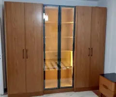 Storage bed next to a display wardrobe